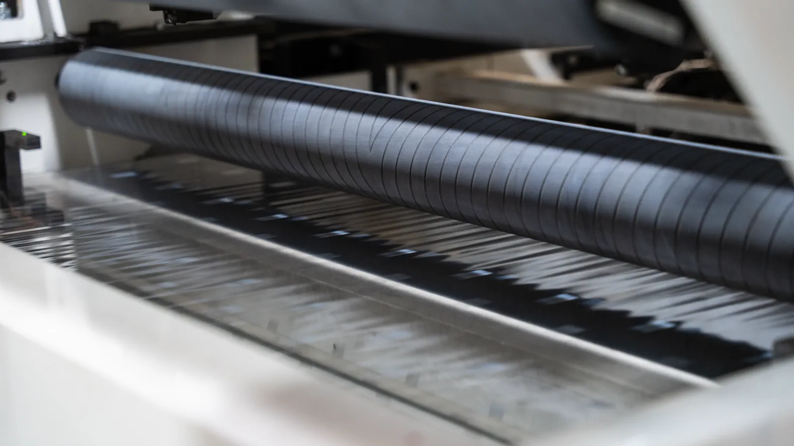 Close-up of a roller with running web in a Flexopack printing press